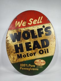 DST Wolf's Head Motor Oil oval sign