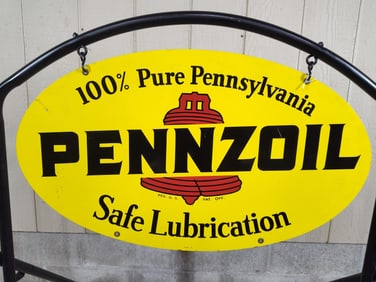 DST Pennzoil sign with frame