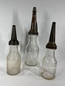3- Huffman glass 1qt oil bottles