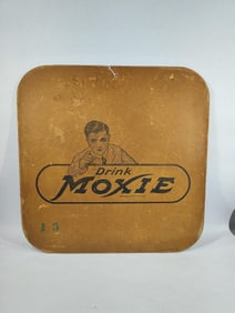 Moxie fiberboard sign