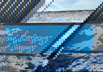 Oversized SSS Twisted Antiques and Uniques sign