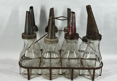 8- Various glass 1qt oil bottles with carrier