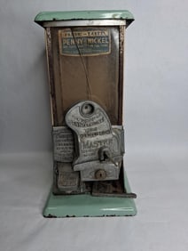 Norris Mfg Master Penny/Nickel porc coin-op candy dispenser