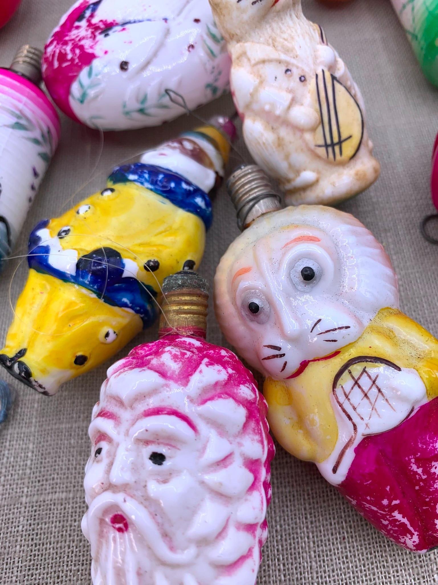 19 pc Vintage Milk Glass & Composite Christmas Tree Light Strand Lion, Cat, Santa Bulbs & Ornaments: 16 milk glass, 3 composite, one milk glass is a ornament marked West Germany, old string and hooks on some, fab assortment in vivid hues, Untested.