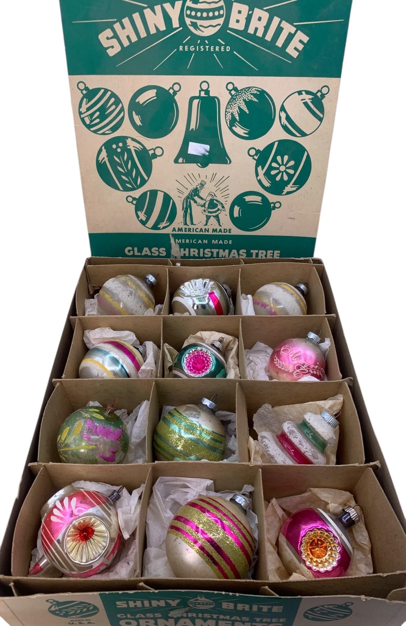 12 Mid Century Mercury Glass Christmas Ornaments in Large Shiny Brite Box: Triple and double indent, striped, glittered, stenciled and hand painted detailing, USA, Shiny Brite, West Germany embossed caps, sides missing on the large Shiny Brite box lid.
