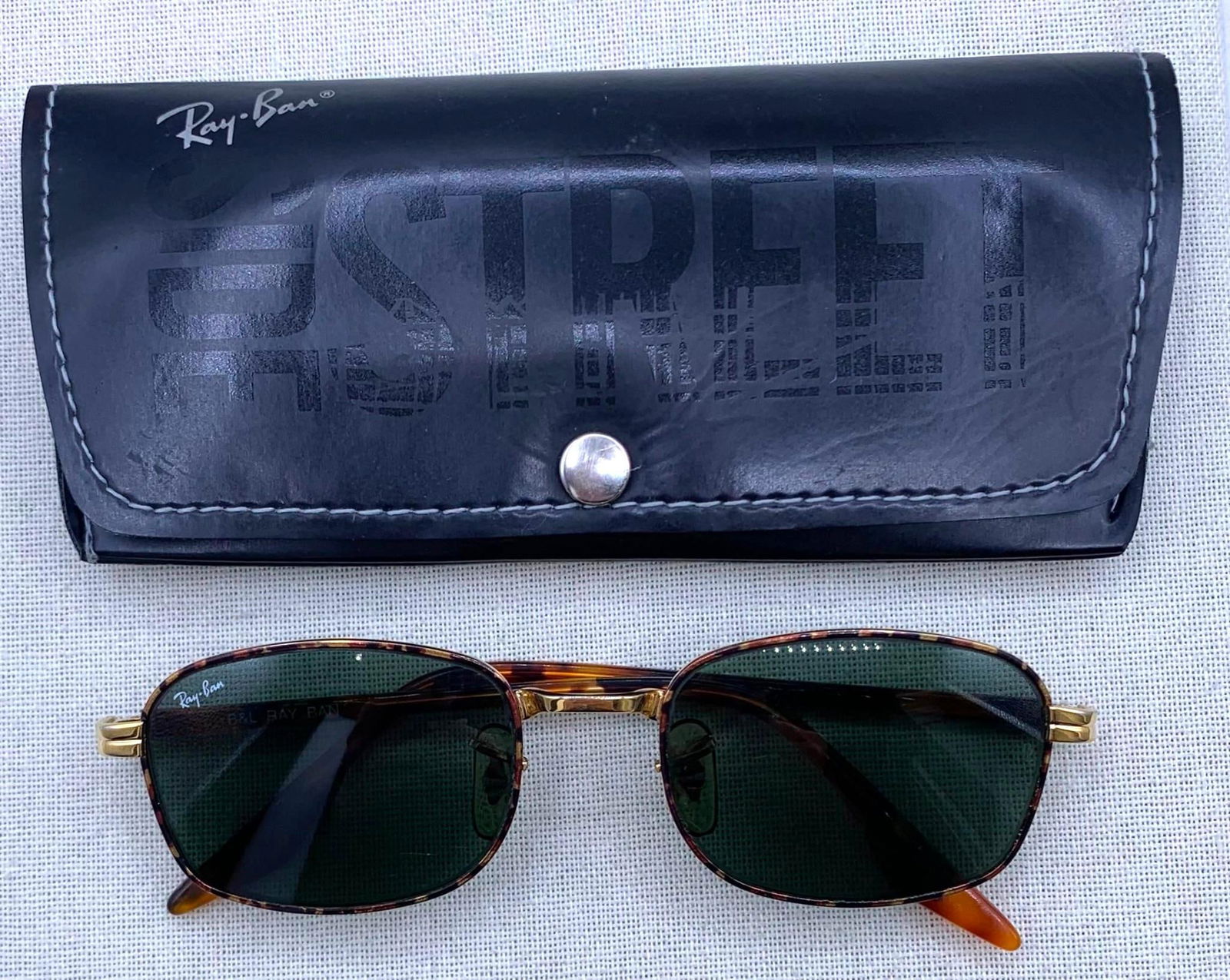 Vintage Faux Tortoise B & L RAY BAN Sidestreet Crosswalk W2190 Gold Frame Sunglasses with Case: G-15 gray green glass lenses, Ray Ban logo on right lens, BL etching on the left, gold metal frame with tortoise ear stems, soft Sidestreet case, minor age and wear to the materials. 
