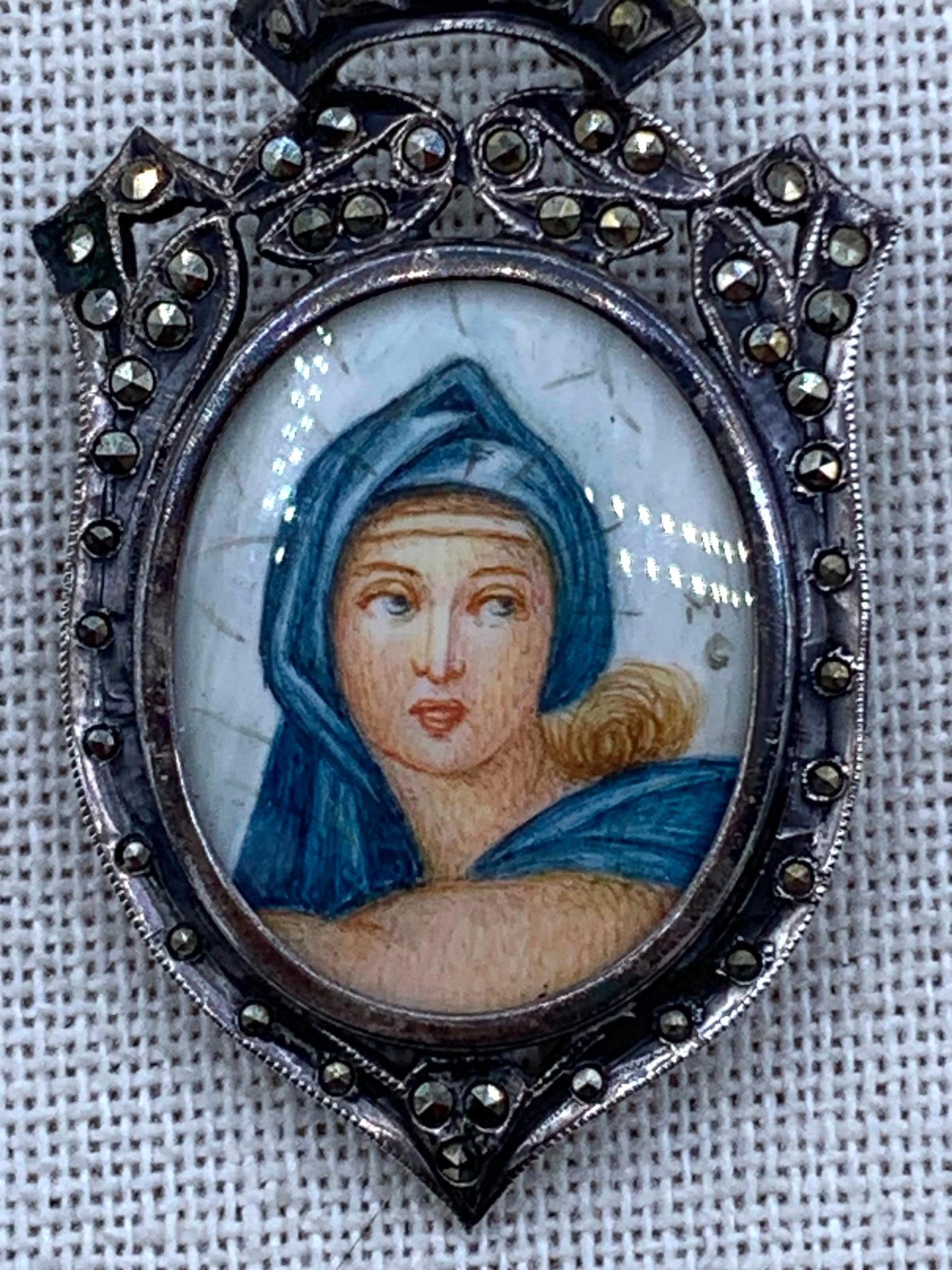800 Silver Marcasite Gem Hand Painted Vintage Porcelain Portrait Shield Brooch, Pendant: 9 gram weight, marcasite gem accents, 3 faux pearls absent from the crown, 2" length x 1 1/4", 800 hallmark, working closure with chain loop.