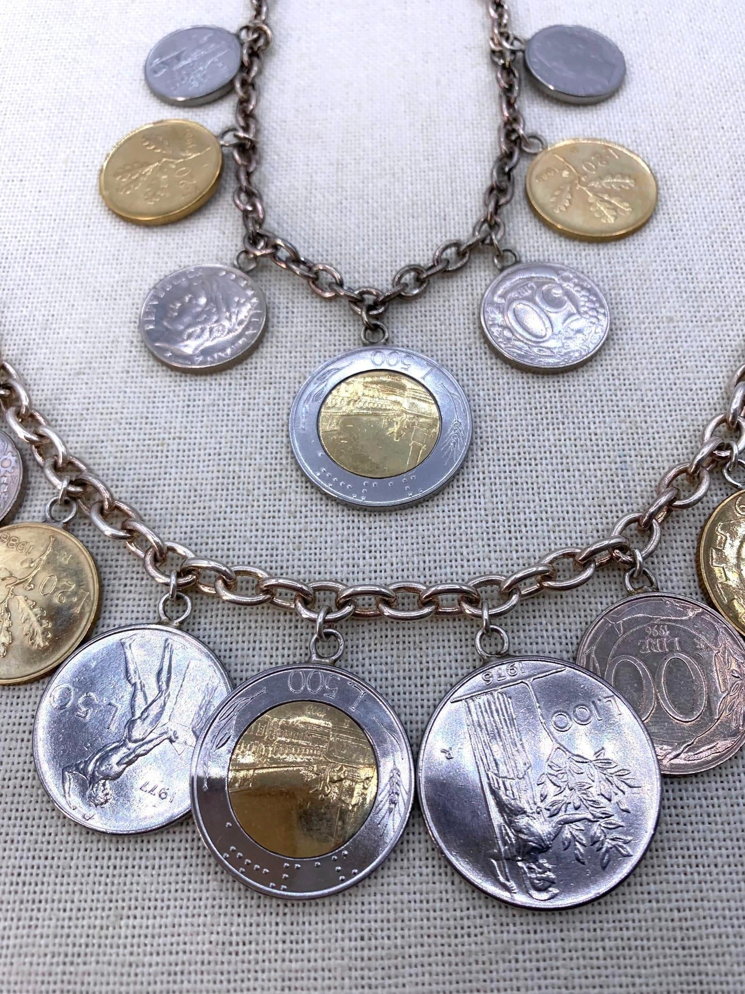 MILOR Italy 925 Sterling Silver Chain Italian Lira Coin Necklace & Bracelet Set: 925 Milor Italy hallmarks on the necklace and bracelet, each decorated with Italian coins in varying denominations.* Bracelet weighs 59 grams, 8" total length* Necklace weighs 51.4 grams, 19 1/2&#