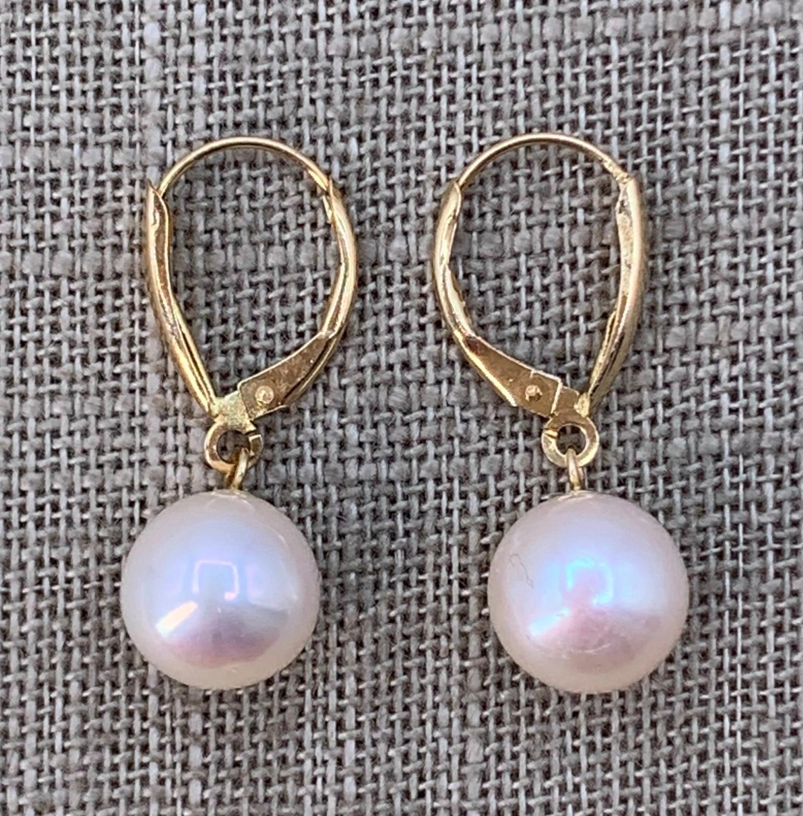 Quiet Luxury 14k Yellow Gold 9.5mm Creamy Freshwater Pearl Lever Back Earrings: 14k hallmark, luminous large size (9.5mm to 10mm) cream hued pearls, working lever back, 1" length.