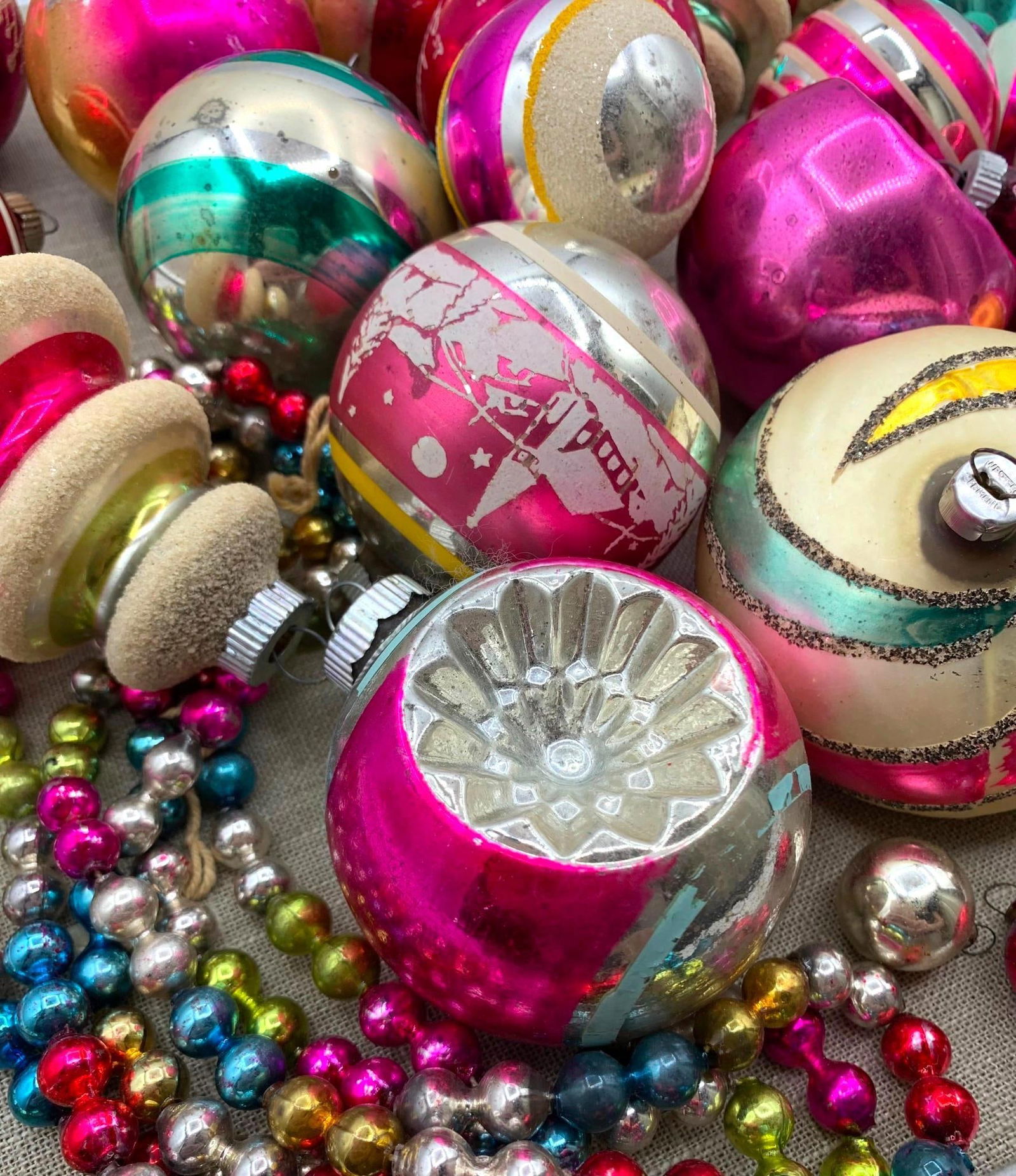 35 pc Vibrant Mid Century Mercury Glass Christmas Tree Ornaments & Antique Glass Garland: Fantastic hues, indent, stenciled, glitter trimmed, atomic shapes, antique strand of glass garland, early Shiny Brite box base, Western Germany, Shiny Brite, USA embossed metal caps.