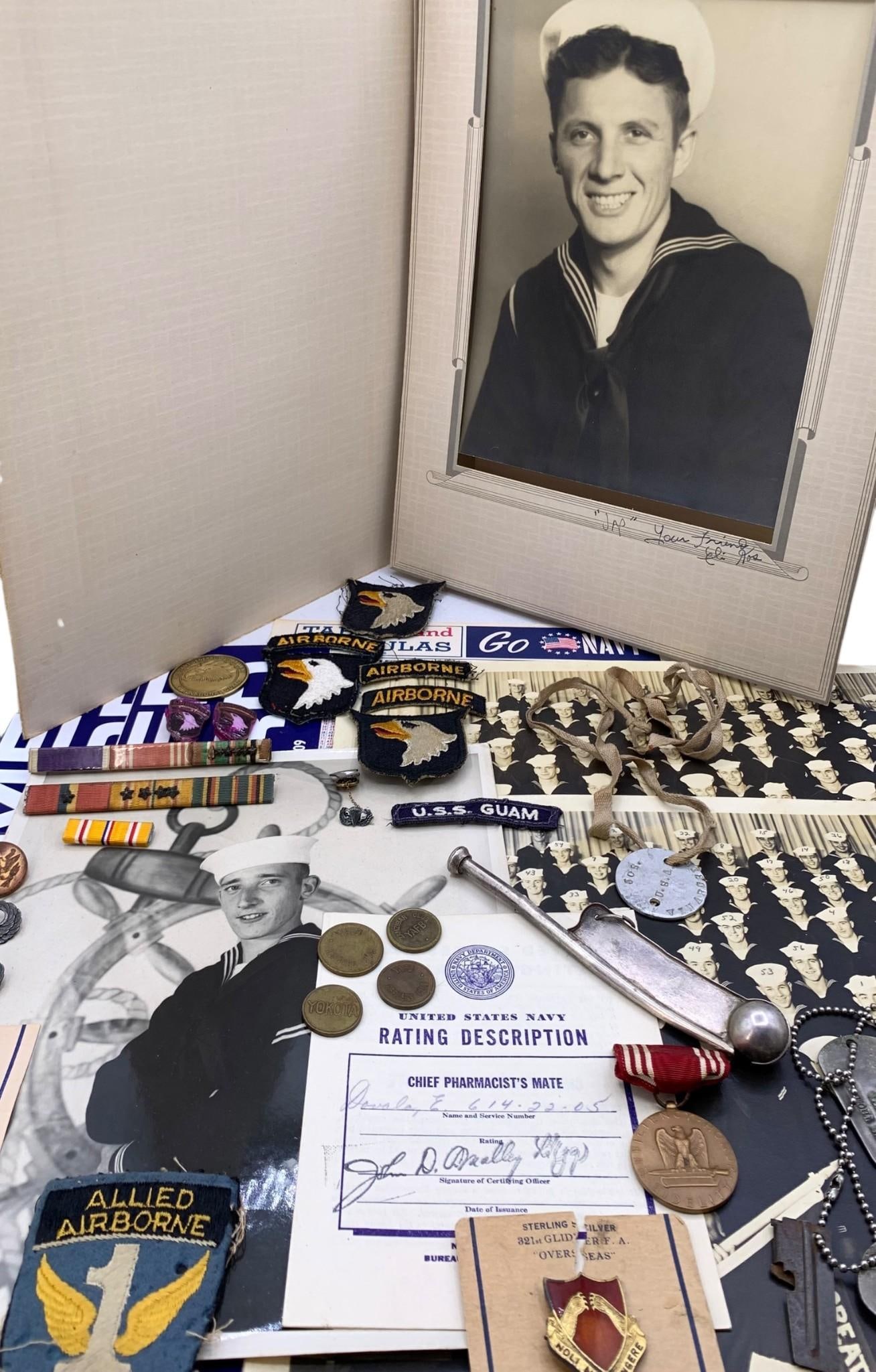 36 pc WWII to Korea US Military Navy, Airforce, Army Patches, Sterling Badges, Dog Tags, Photographs: Fantastic vintage military collection including US Army Sterling Parachutist (and Senior Parachutist) Jump Wings badges, 101st Airborne division (WWII Corporal Joseph Karasevic was a parachutest and m