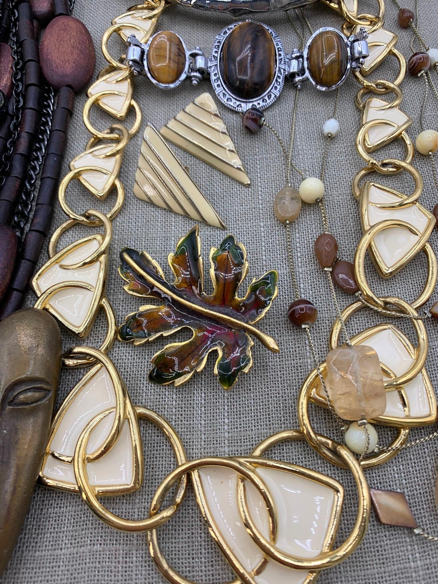 57 pc Vintage Smoky Topaz, Tigers Eye, Sterling, Kunio Matsumoto Earth Toned Jewelry Collection: Including a incredible pair of Mid Century Swank Brazilian smoky topaz cufflinks, Large 22x11mm faceted topaz pendant, Sterling Silver Tigers Eye cabochon ring hallmarked 925, Trifari Kunio Matsumoto