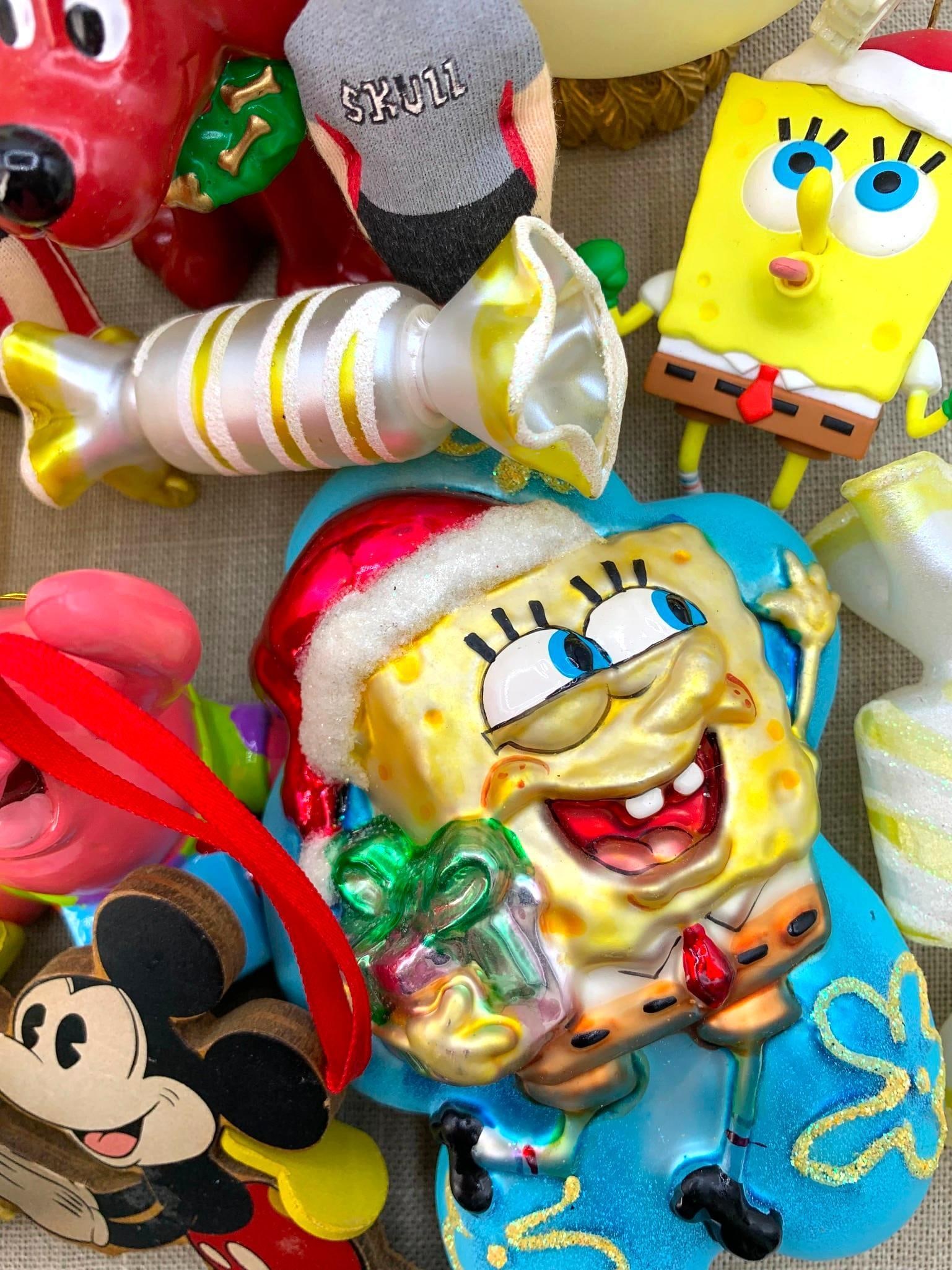 29 South Park, Sponge Bob, Beavis & Butthead, Winnie the Pooh, Mickey Mouse Christmas Ornaments: Glass, composite, porcelain, cloth and wood vintage character ornaments, 4 blown glass candy ornaments in the mix.