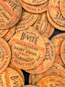 100 Vintage Wilbur B-VITE Chocolate Flavored Dairy Drink Milk Bottle Caps & Milk Man Order Slips