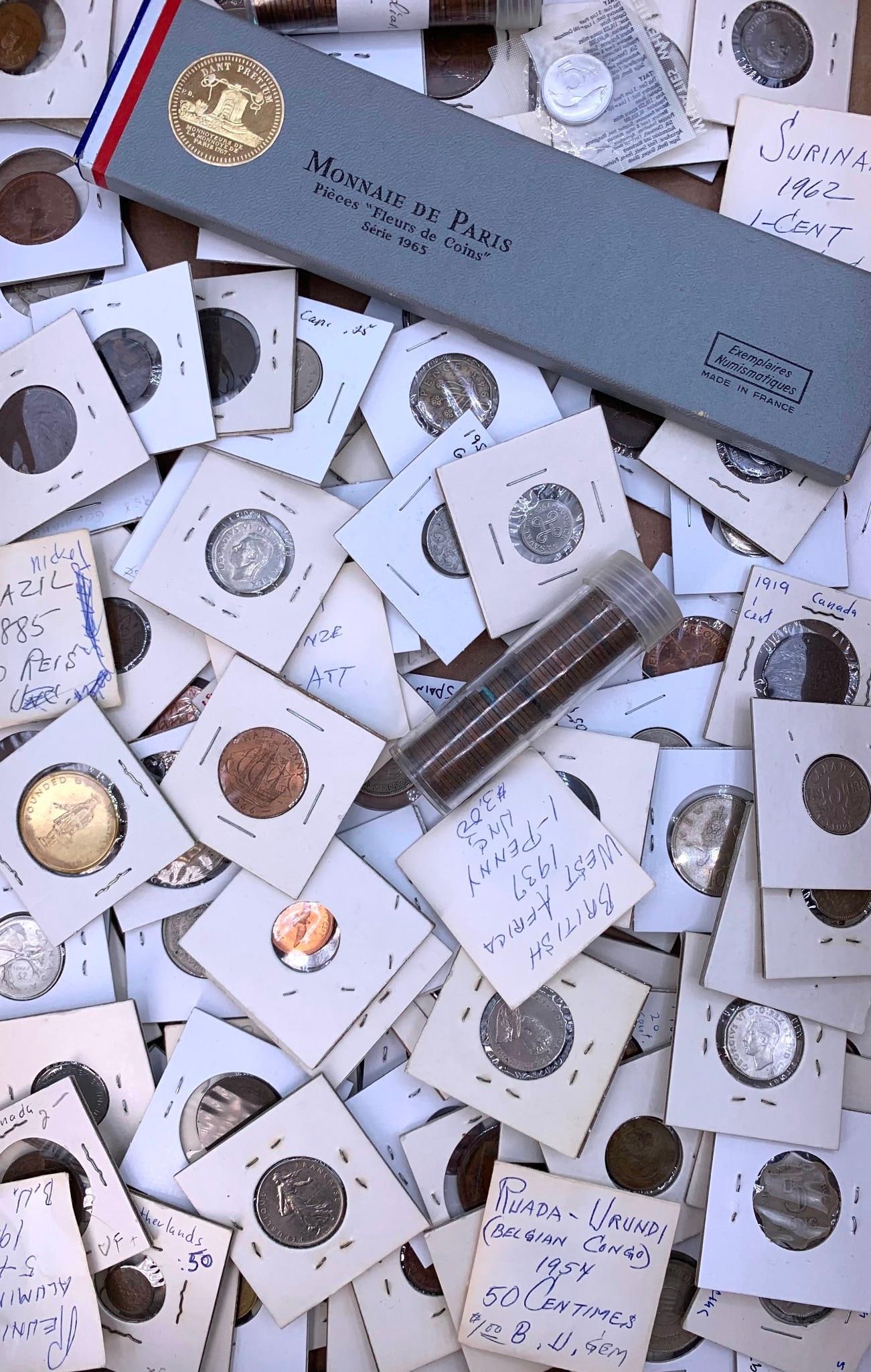 210 pc Antique to Vintage International Coin Collection: From a 50+ year collection...coins spanning over a century in assorted denominations, materials and eras, one composite coin storage case included.