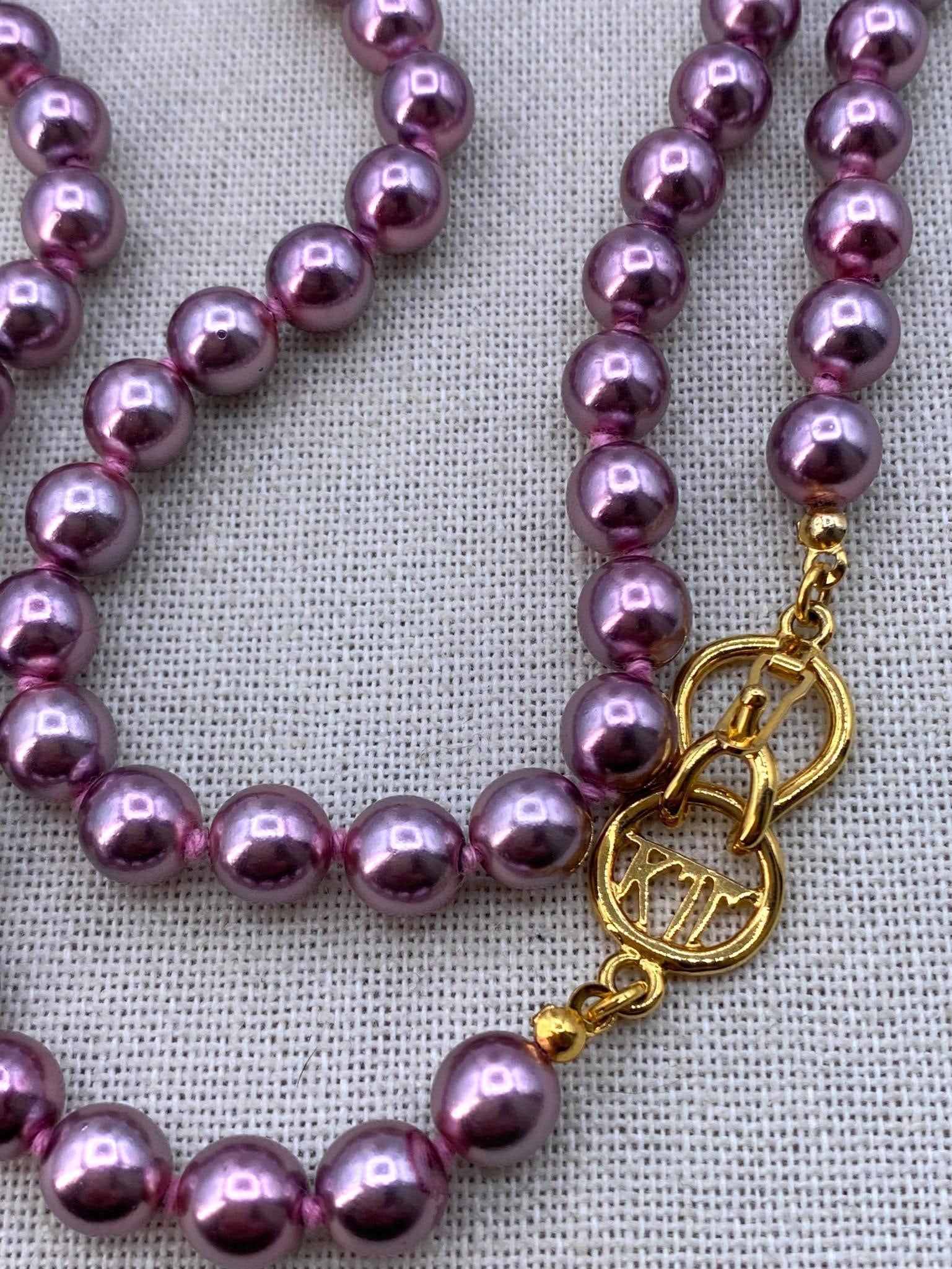 40 pc Kenneth J Lane, Amethyst, Peacock, Coin Pearl Jewelry Collection: Incredible selection of lavender hued adornments, 52" circumference KJL hand knotted lavender faux pearl necklace, dusky pink coin pearls, woven peacock bead fringed kerchief, Heidi Daus lavender rhin