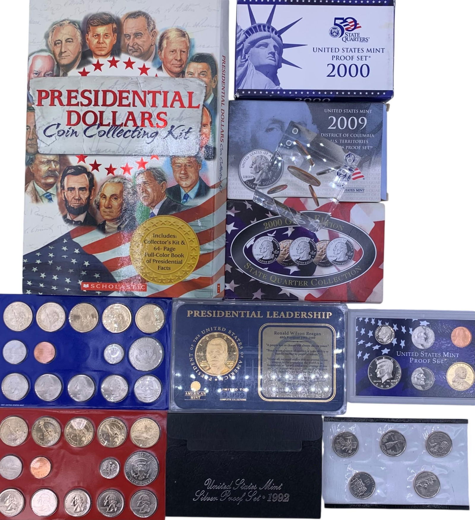 Large Uncirculated and Proof US Coin Collection: Coins cased, sleeved or inside of the book, one 1974 Lucite coin cube and Reagan medallion in the mix.
