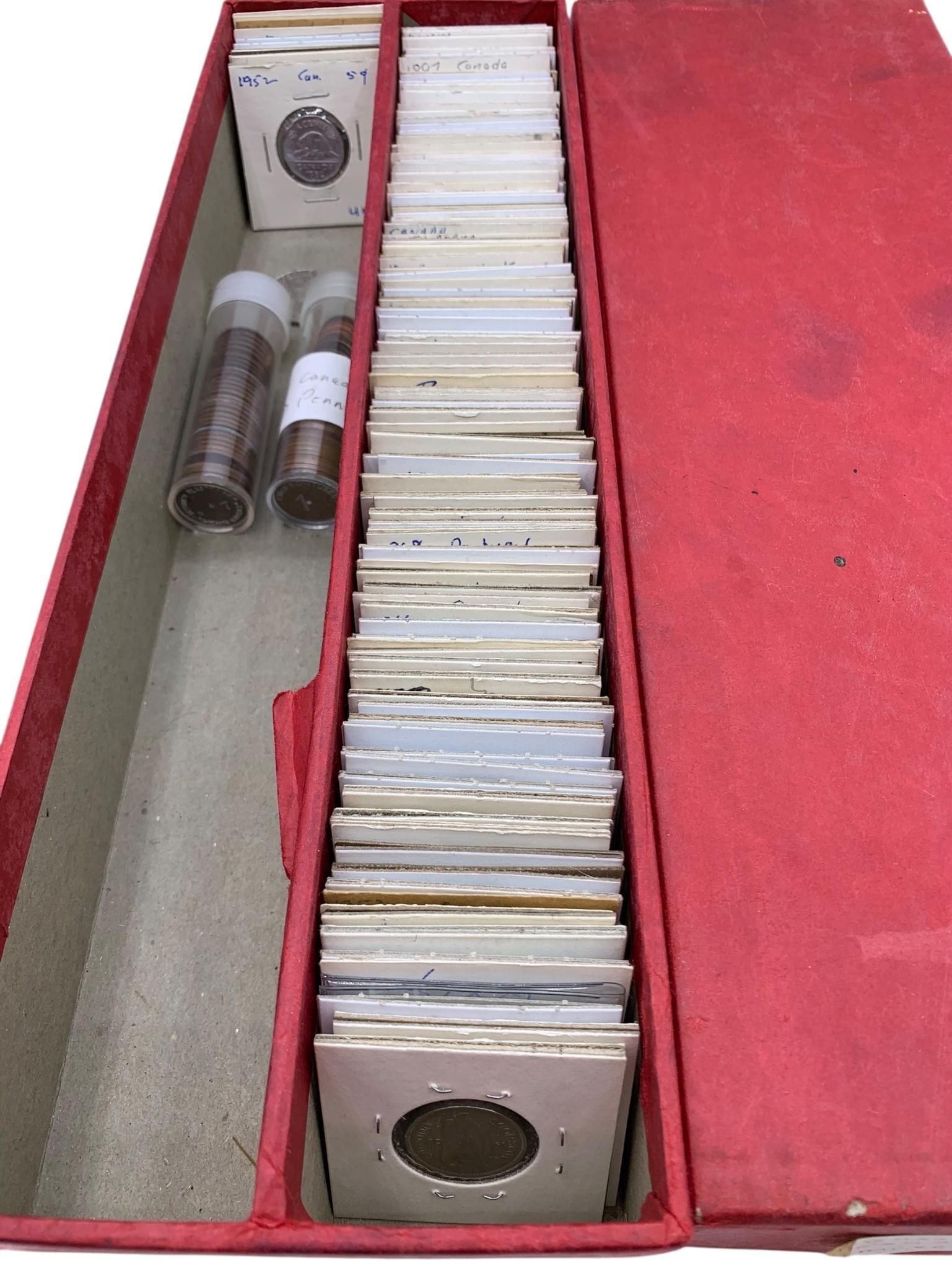 176 pc Antique to Vintage International Coin Collection: Fantastic variety of coins, many in coin sleeves, some with hand writing, 2 plastic coin rolls in the mix along with a old 14 1/4" paperboard storage box.