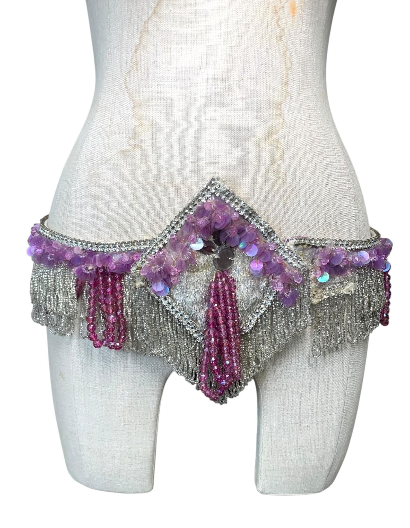 Mary Ann Vash's Mid Century 2 pc Vintage Lavender Belly Dance Costume, Finger Cymbals & Dance Books: Worn by professional belly dancer and?Ohio Native Mary Ann Vash, who performed on the Dick Van Dyke Show and ran her own dance studio... Glittering hand sewn glass seed beads, draped lavender bead fri