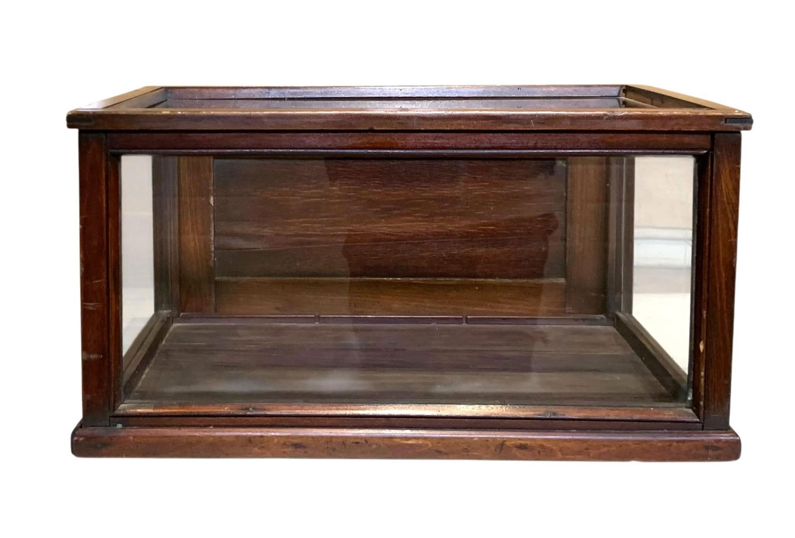 Antique General Store Glass & Wood Countertop Display Cabinet, Early Shop Showcase: Hinged rear door, 4 good clear glass panes with early wood frame and wood base, brass knob and latch (does not catch securely), 17" x 12" x 9", slotted grooves inside where vertical dividers once were