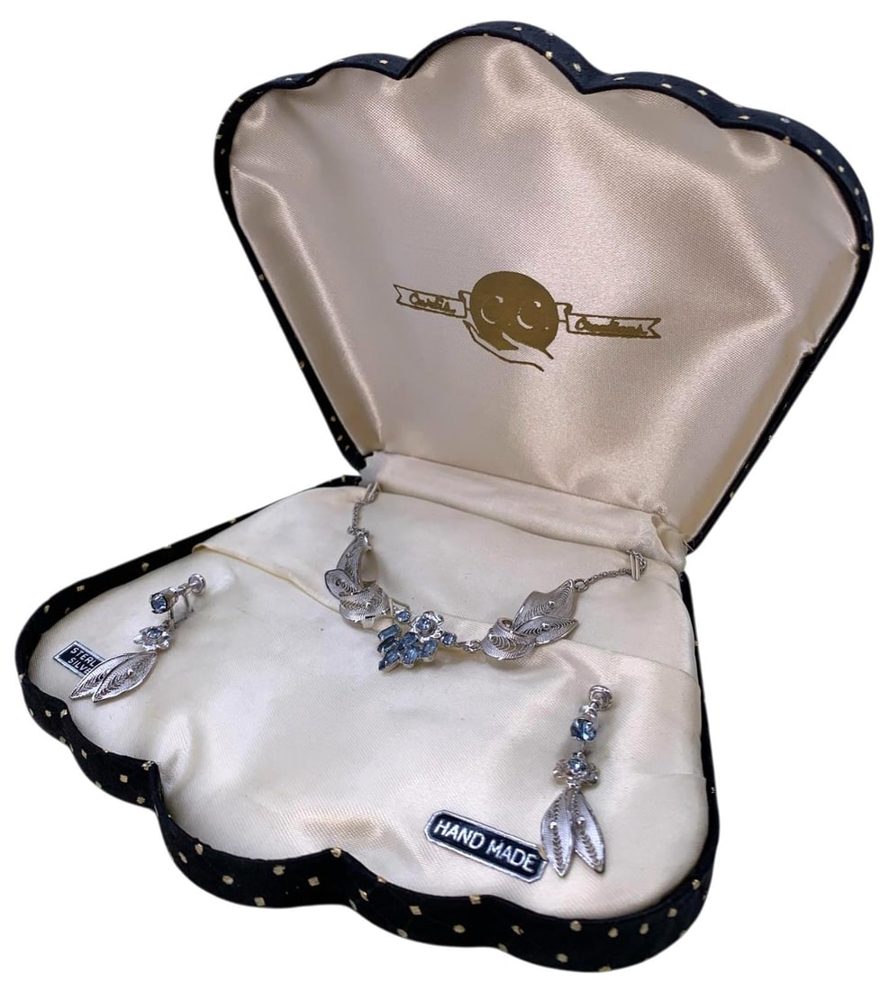 Unworn CURTIS CREATIONS Mid Century Sterling Silver Filigree Necklace & Earring Ensemble in Case: Satin lined clam shell case, Curtis Creations Logo, Sterling filigree screw back earrings with choker length azure rhinestone necklace, all remaining wired/pinned on the satin liner, appearing Unworn.