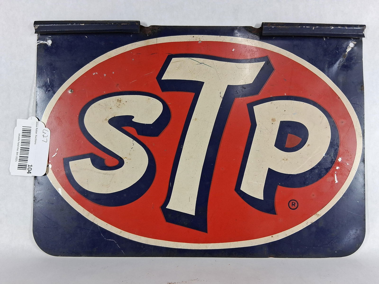 Double Sided STP Tin Sign: Top is folded over for mounting to a display. Overall good condition with only a few minor scratches. 15.5x11