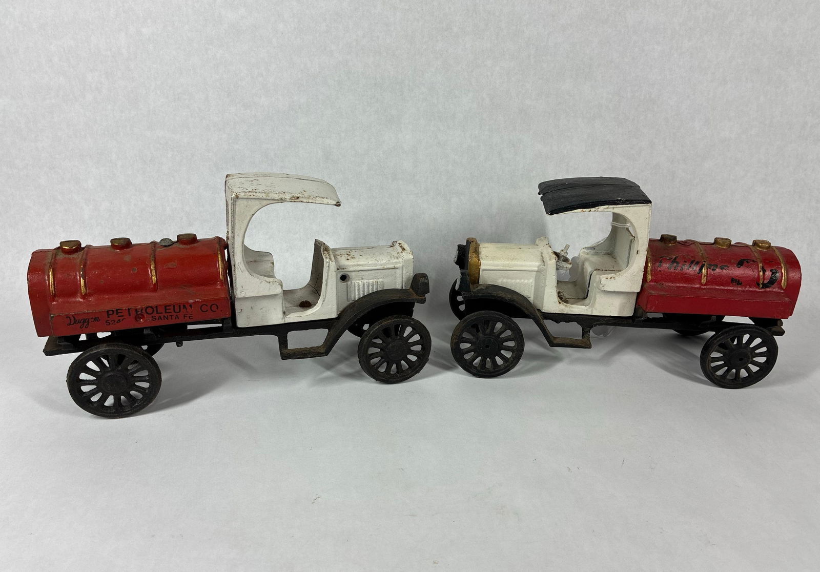 Cast Iron Duggan Oil & Phillips 66 Tanker Truck Toy Replicas: Showing paint and finish loss due to age and play?10 in. L?