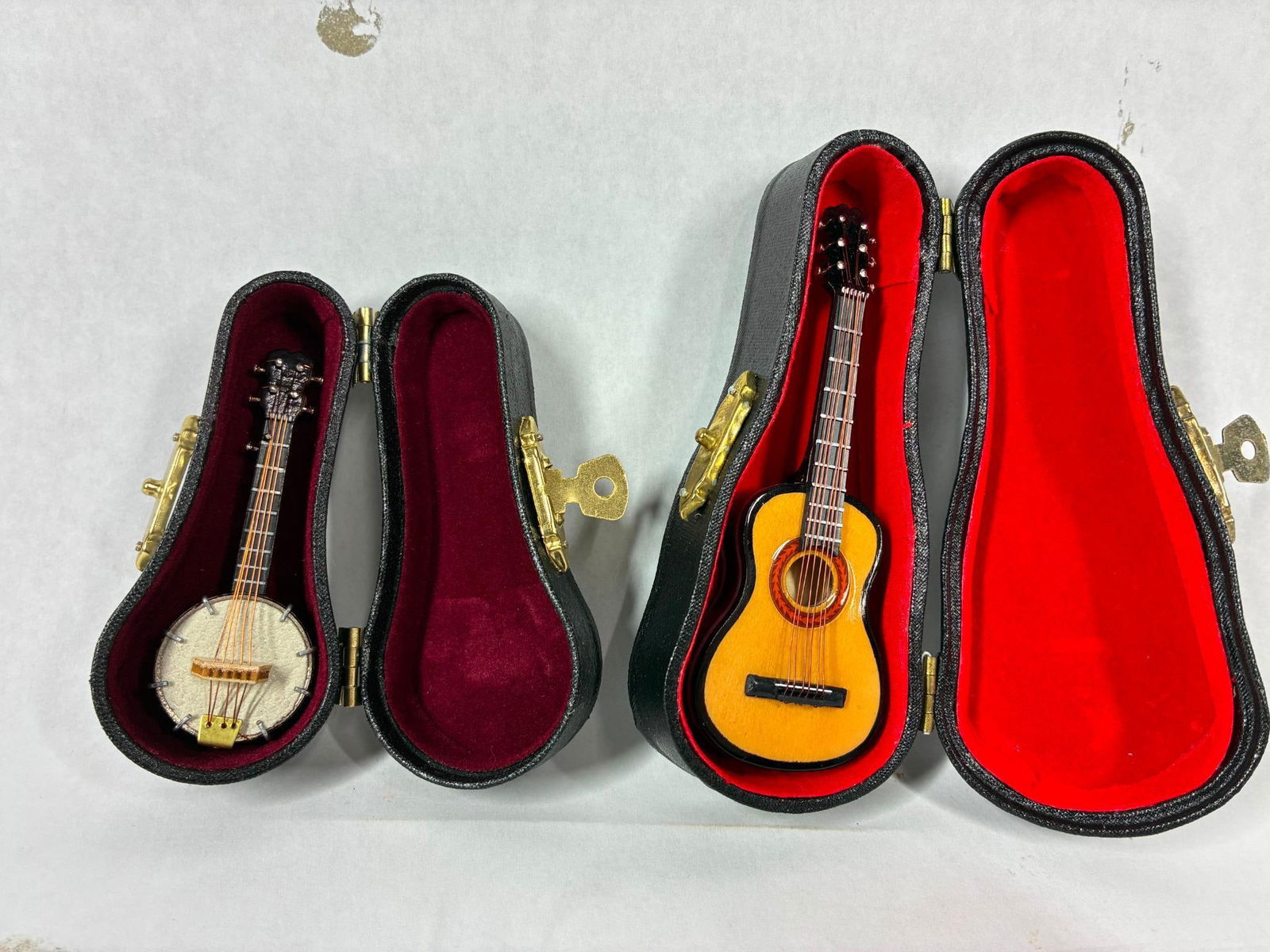 Miniature Acoustic Guitar & Banjo: Each with a case. 3 and 4 inches