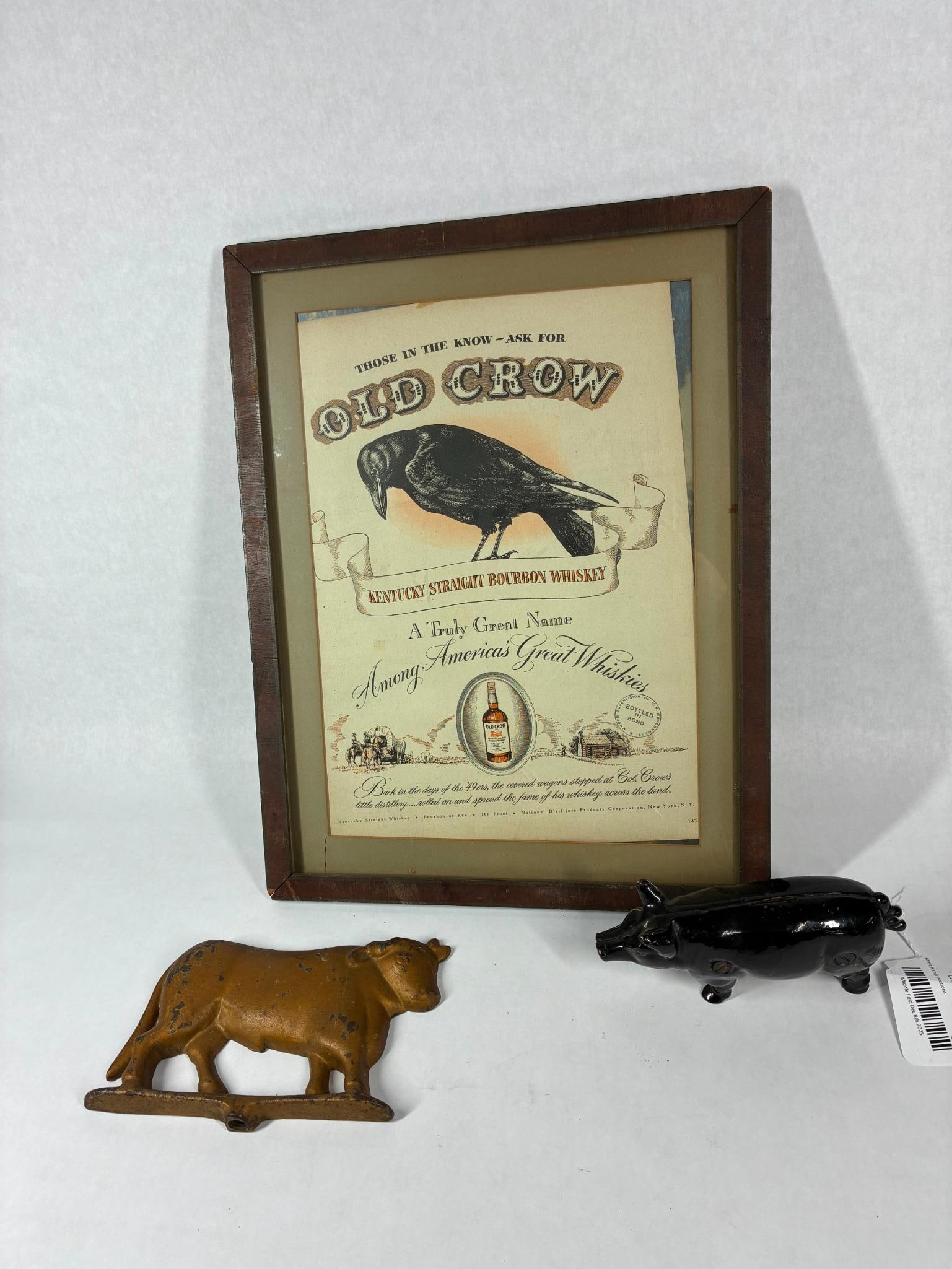 Cast Iron Farm Animals and Old Crow Whisky Framed Print: Old hog coin bank, Bull topper, and framed print is 17x13
