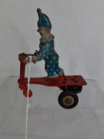 Tin Litho Roli Zoli Wind Up Clown on Red Scooter Budapest