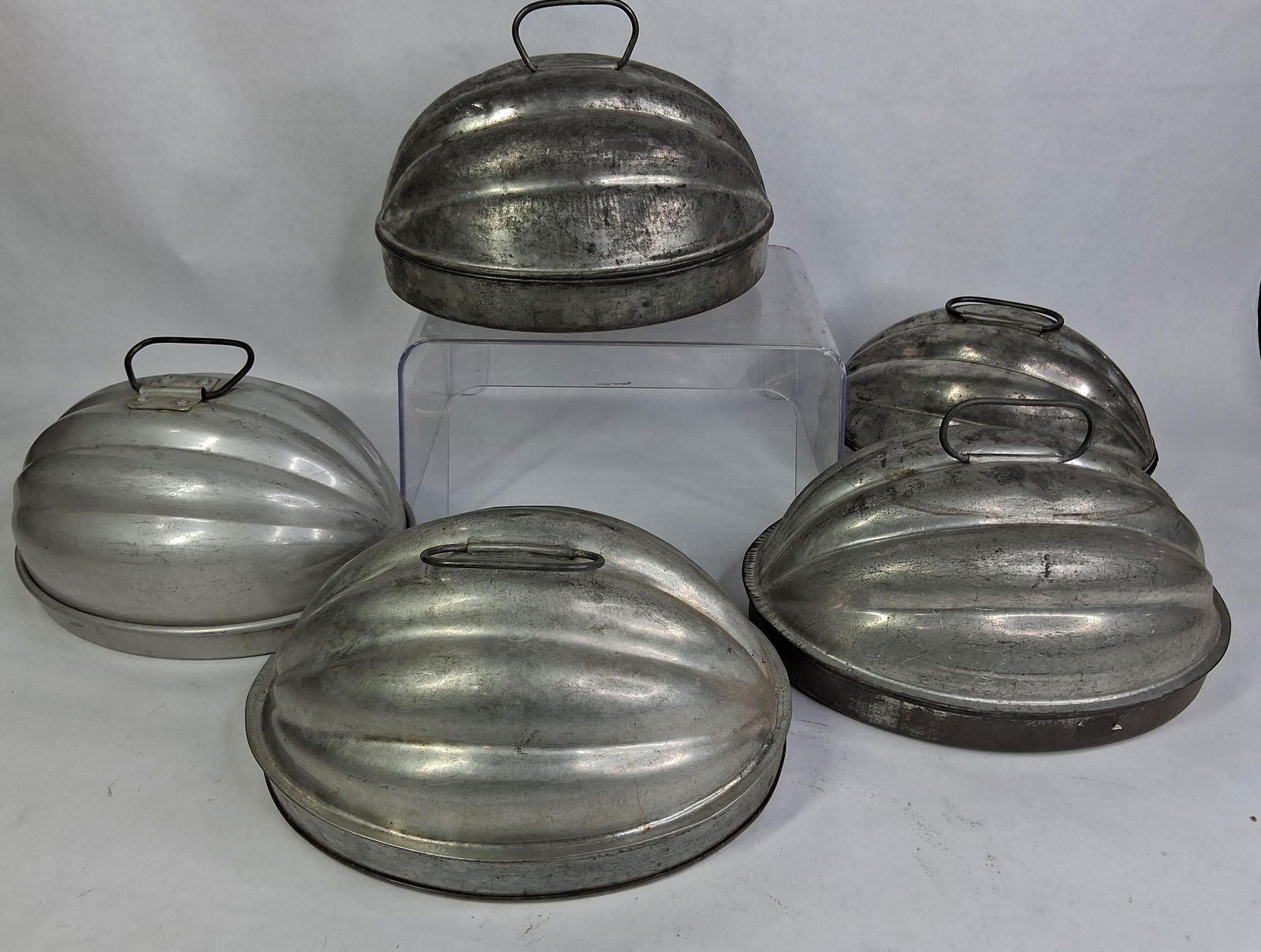 5 Pudding Molds: Each is a two piece with handles. All in good condition.