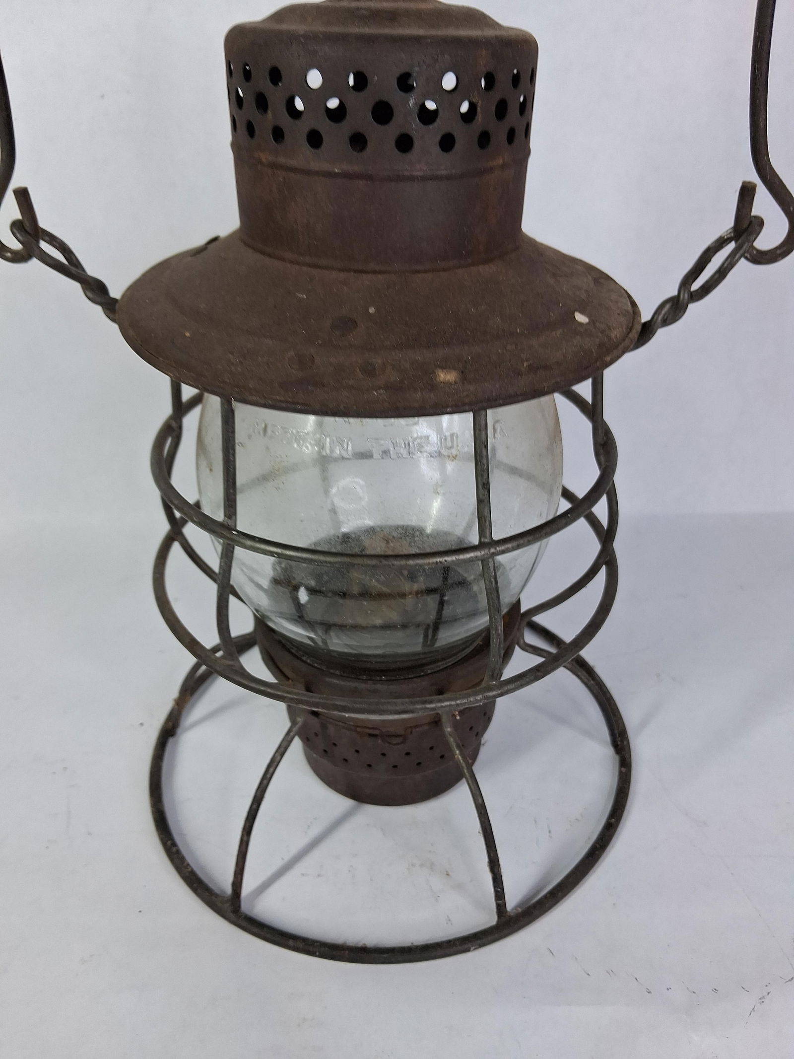 Rayo No 39 WB Lantern: Embossed globe an and body matching. Surface is rough but in good condition. 10 inches tall