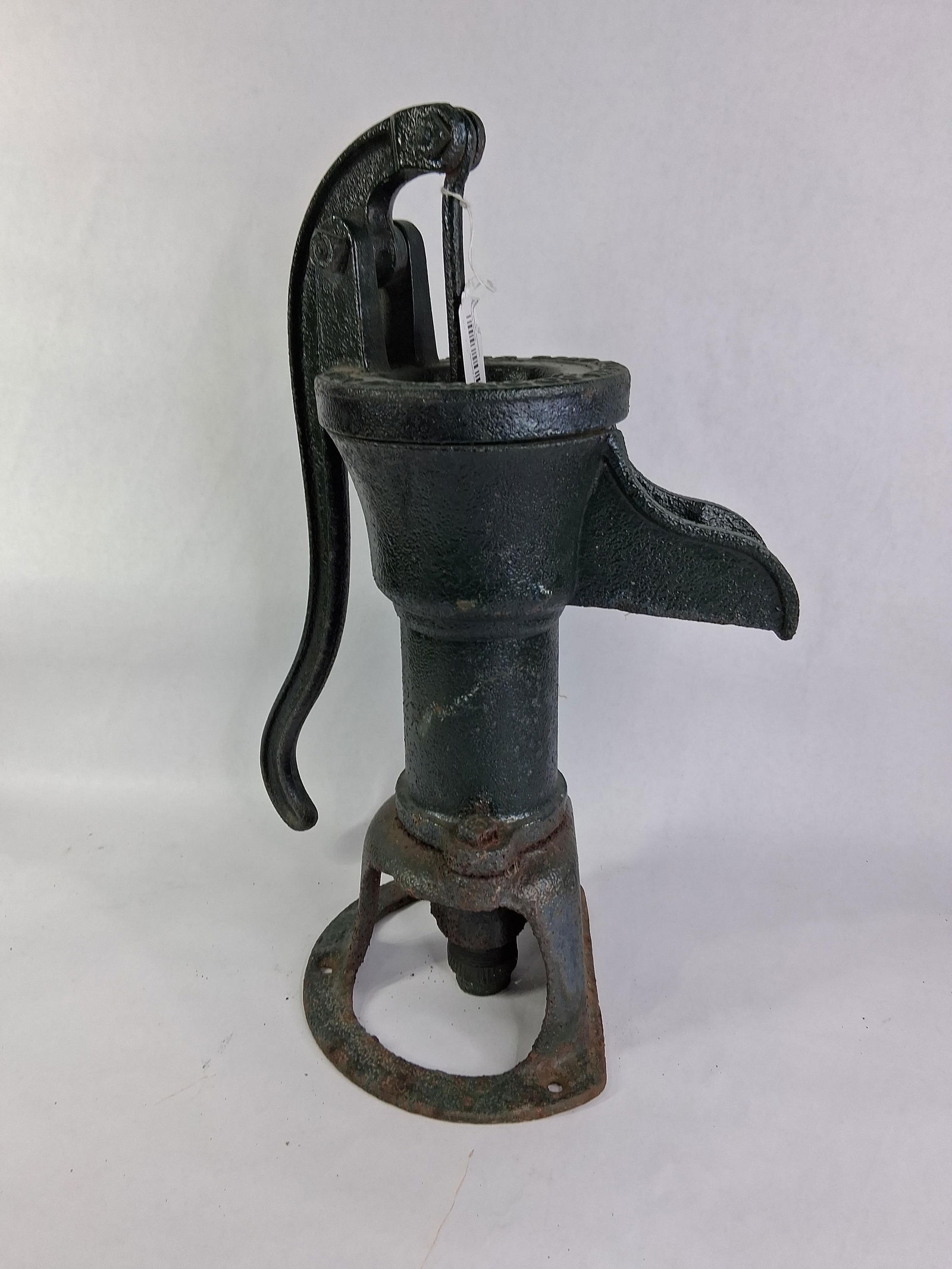 The Deming Co Pitcher Pump: Salem Ohio. Internals are complete and handle moves up and down freely. Painted green, but a few areas or surface rusting or pitting. 