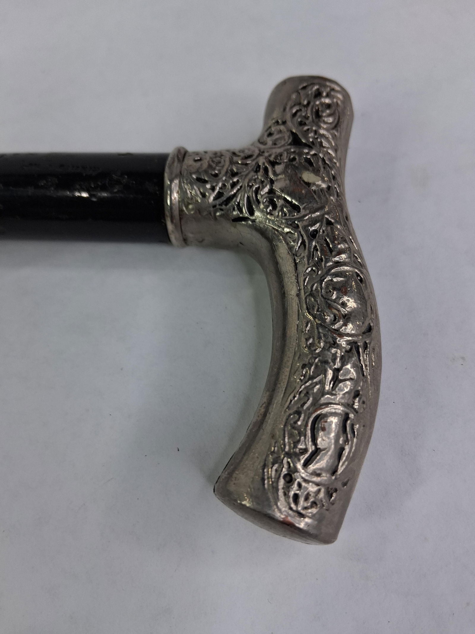 Ladies Sterling Handle Victorian Walking Cane: T shaped floral decorated handle, with a dark ebony wood shaft. 33 inches 