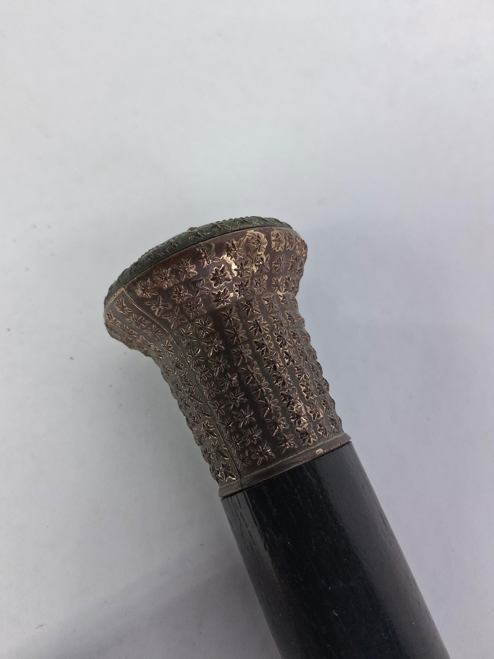 19th Century Flask Dress Cane: A star decorated metal handle with sleek black shaft. Inside you will find 5 glass flasks. 35.5 inches 