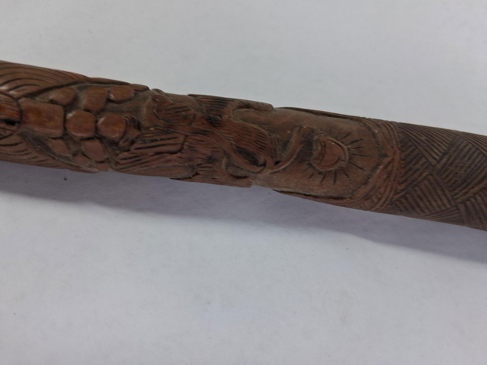 Mexican Relief Carved Wood Walking Cane: Hand carved intricate Mexican coat of arms, eagle clutching a snake image. 33 inches 
