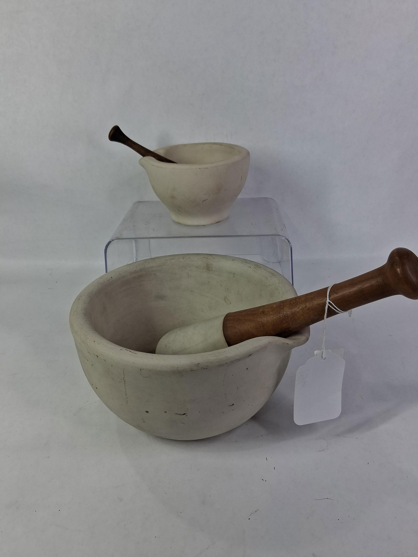 Apothecary Mortar & Pestles: Two heavy ceramic mortars, 5 and 8 inch. Smaller pestle shows some hairlines to end. 