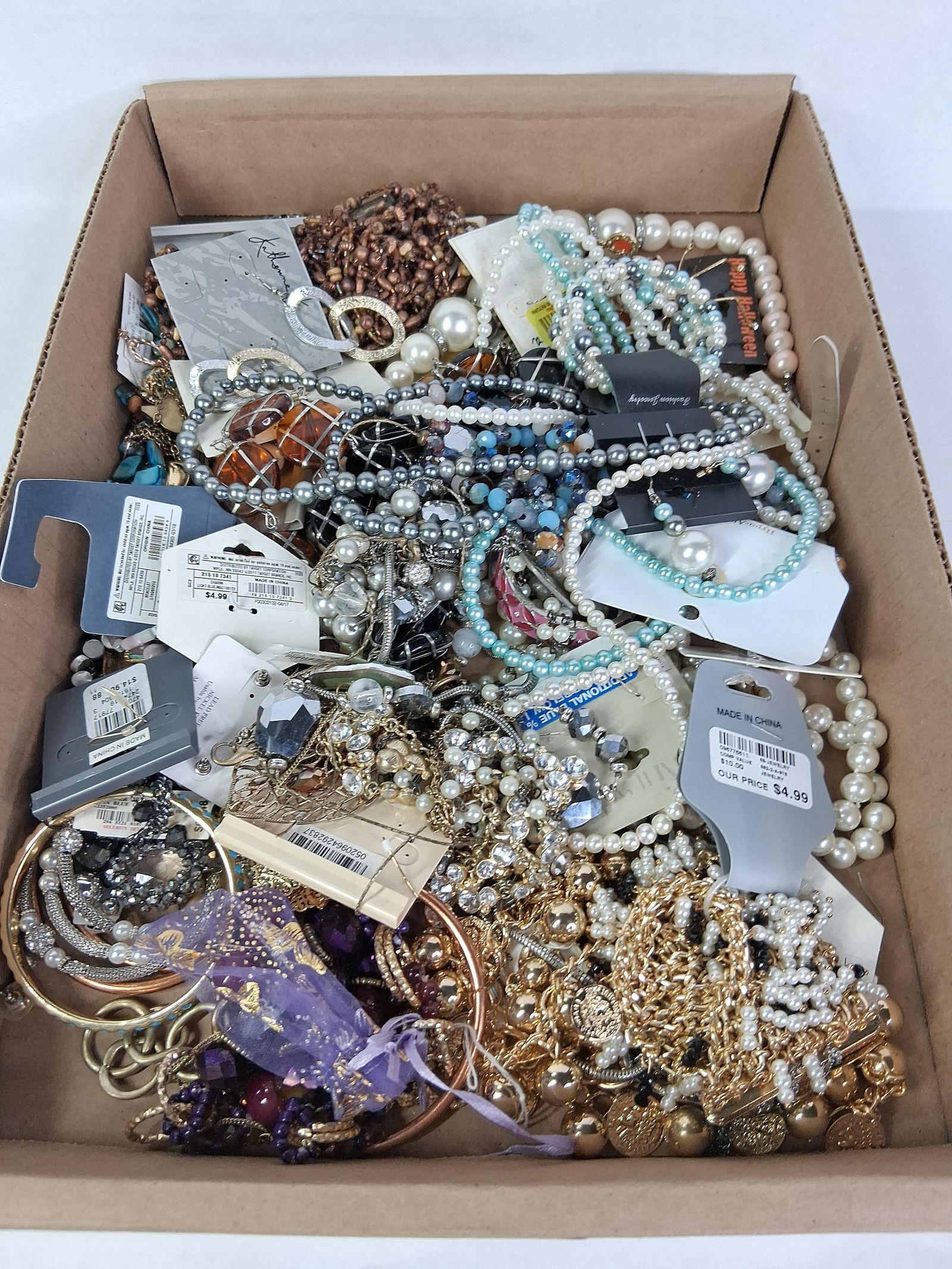 Large Lot of Unsorted Bracelets, Earrings, Necklaces and More: This great lot includes pearls, gold and silver tone jewelry and watches and more. with this lot being unsorted treasures are sure to be found? ?