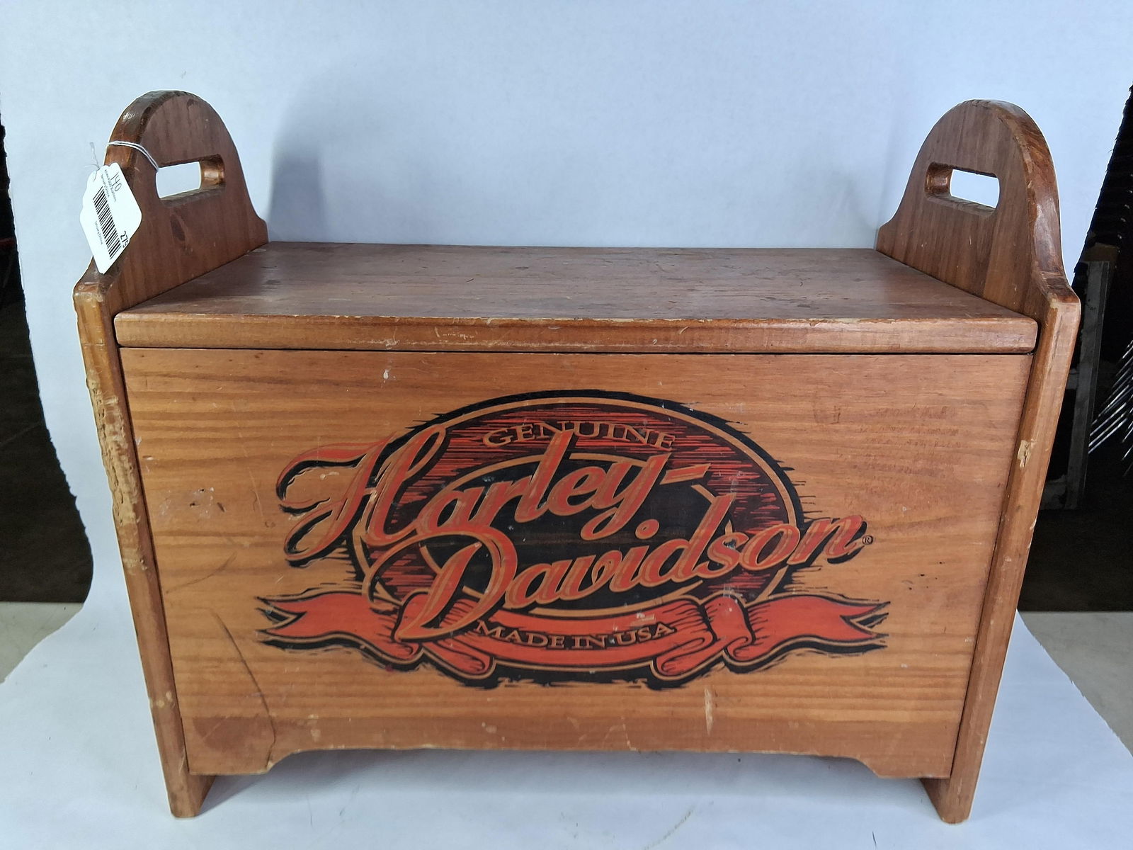 Harley Davidson Lift Top Storage Bench: Harley logo and stenciling to both ends and front. Good sturdy condition. 21.5x10.5x18