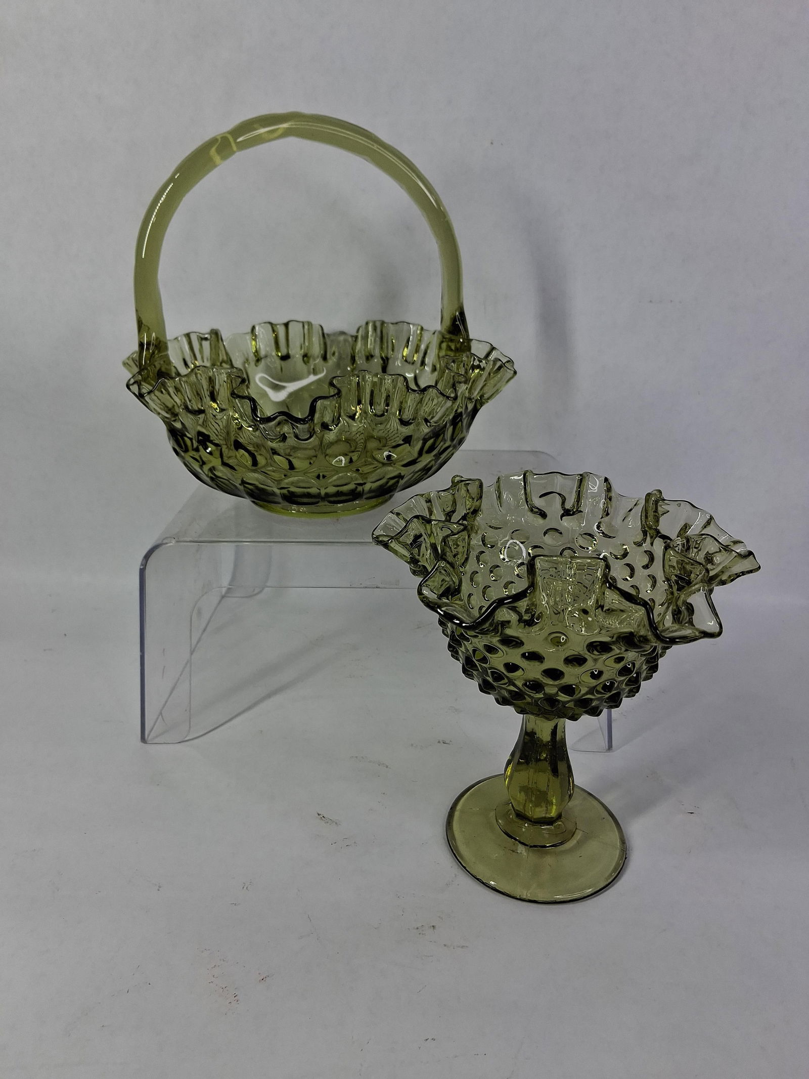 Fenton Colonial Green Hobnail Ruffled Compote and Handled Basket: Great overall condition with no chips, cracks or breaks? compote 6.5 in. H? basket 7 in. H?
