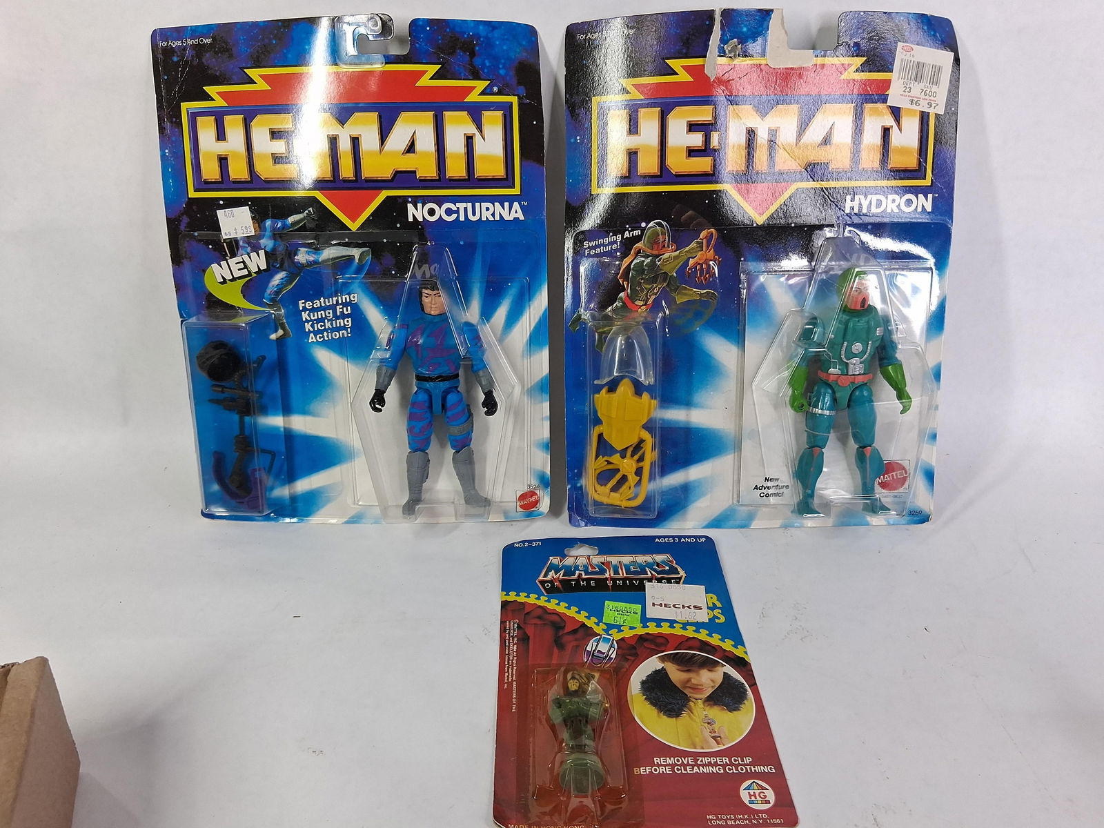 He-Man and Masters of the Universe 1980s Action Figures: Nocturna, Hydron, and Zipper clip. All in original packaging. Dated 1984 and 1989
