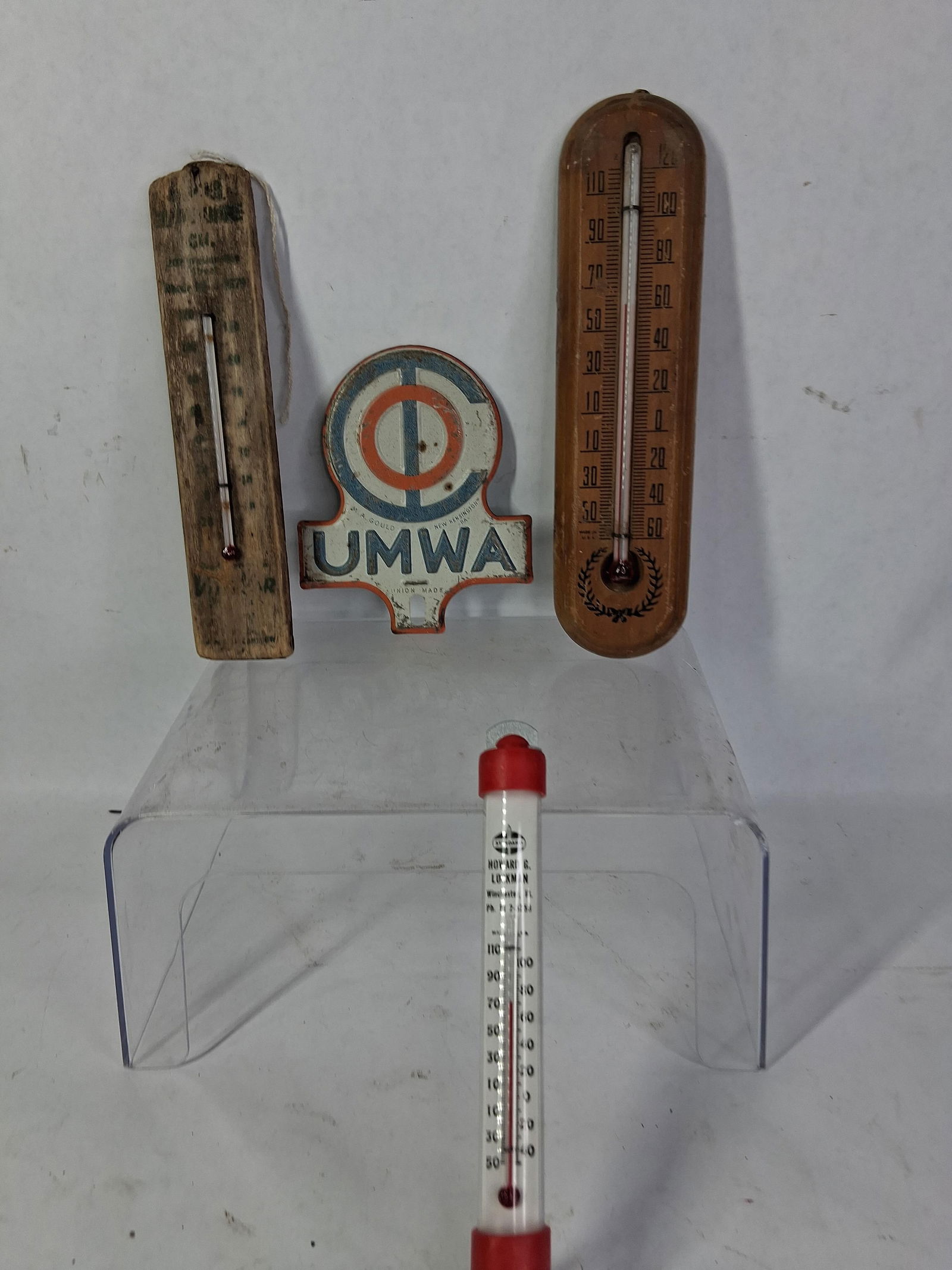 Advertising Thermometers & UMWA Plate Topper: Standard oil thermometer, two wooden thermometers, and a metal plate topper. 