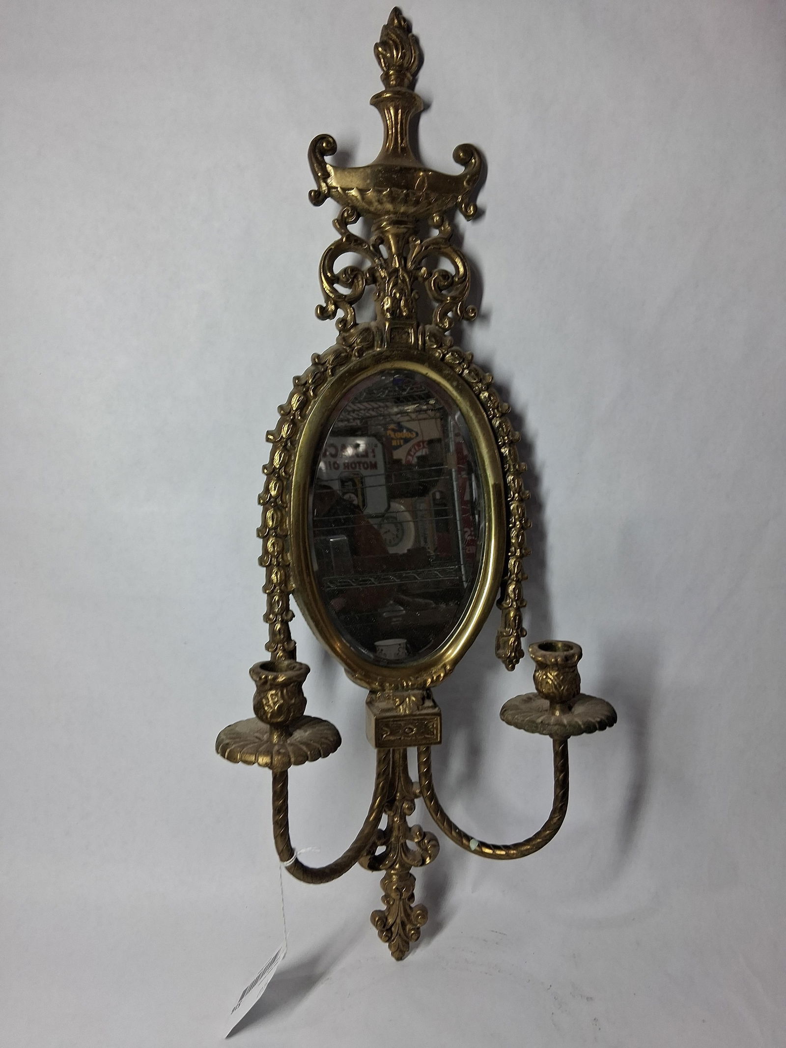 Brass Wall Sconce Mirror: Traditional style with Empire style torch a top. 24x10