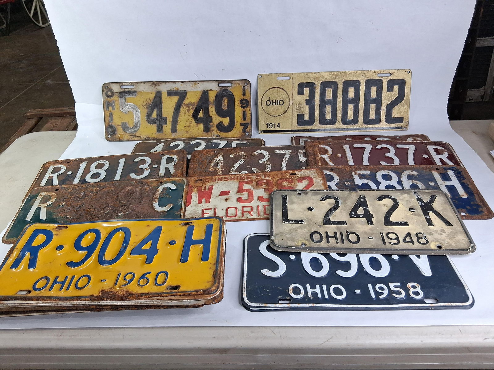 1914-1971 License Plates: Many 1900 teens dates. Some may have spotting or minor surface rust. 