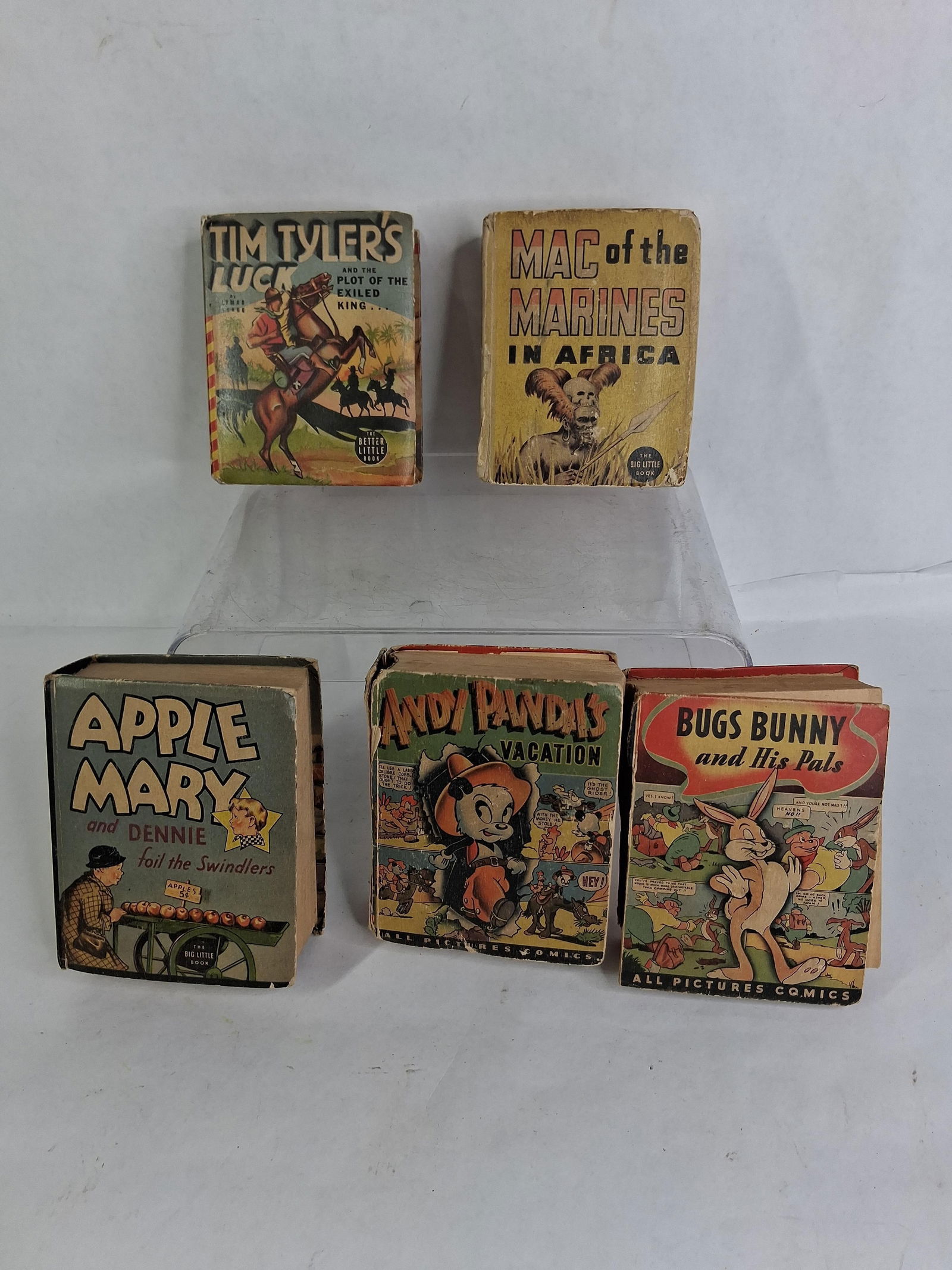 Little Big Story Books: Apple Mary 1936, Bugs Bunny comic- binding issues, Andy Pandas Vacation1946, Mac of the Marines in Africa1936, and Tim Tylers Luck 1939