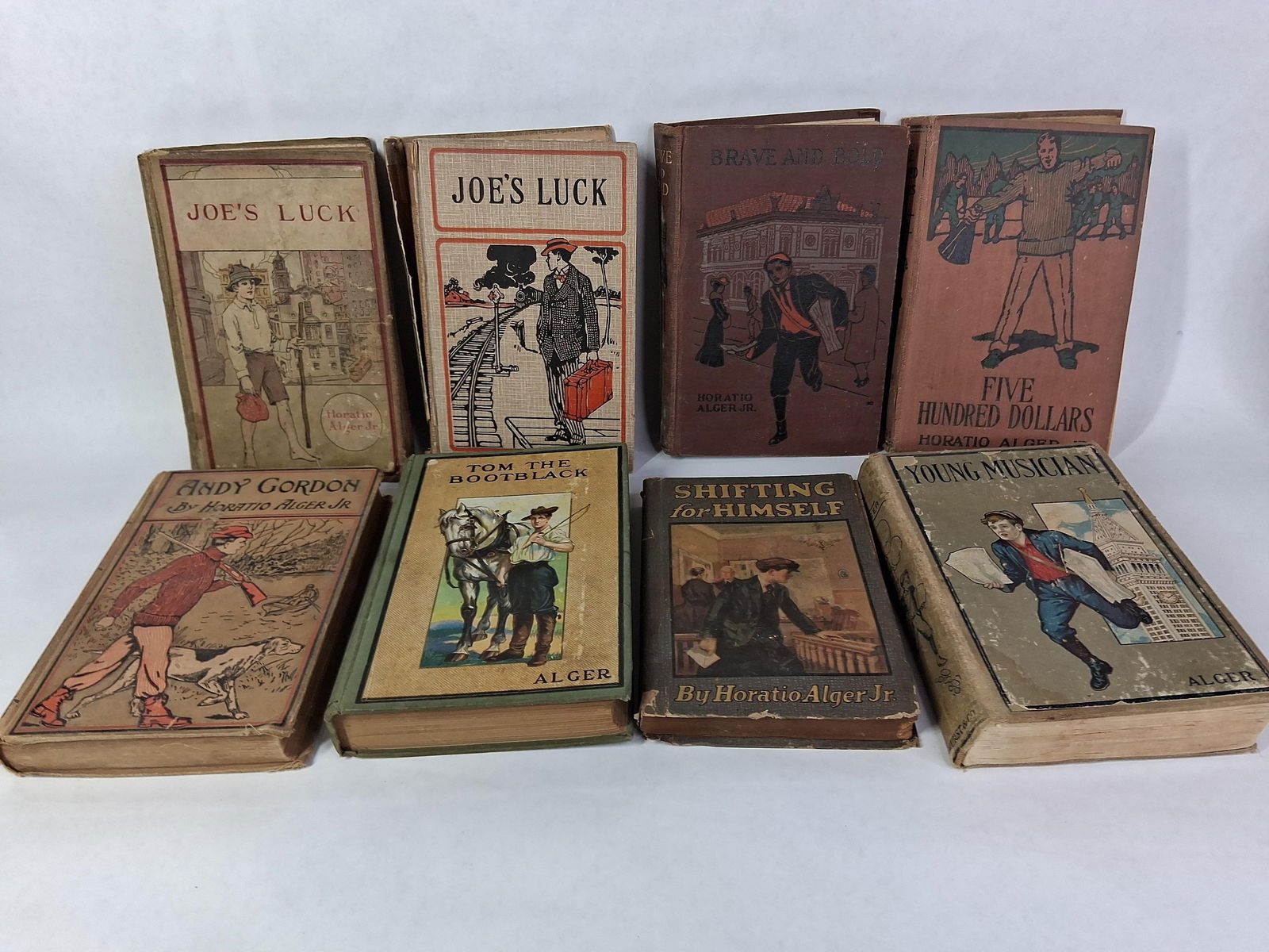 Alger Classic Story Books: 8 books, early 1900s. Some with great imagery to covers. Normal wear from age. 