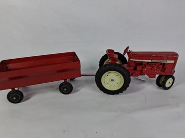 Ertl IH Farmall NF White Stripe Farm Toy Tractor and Wagon
