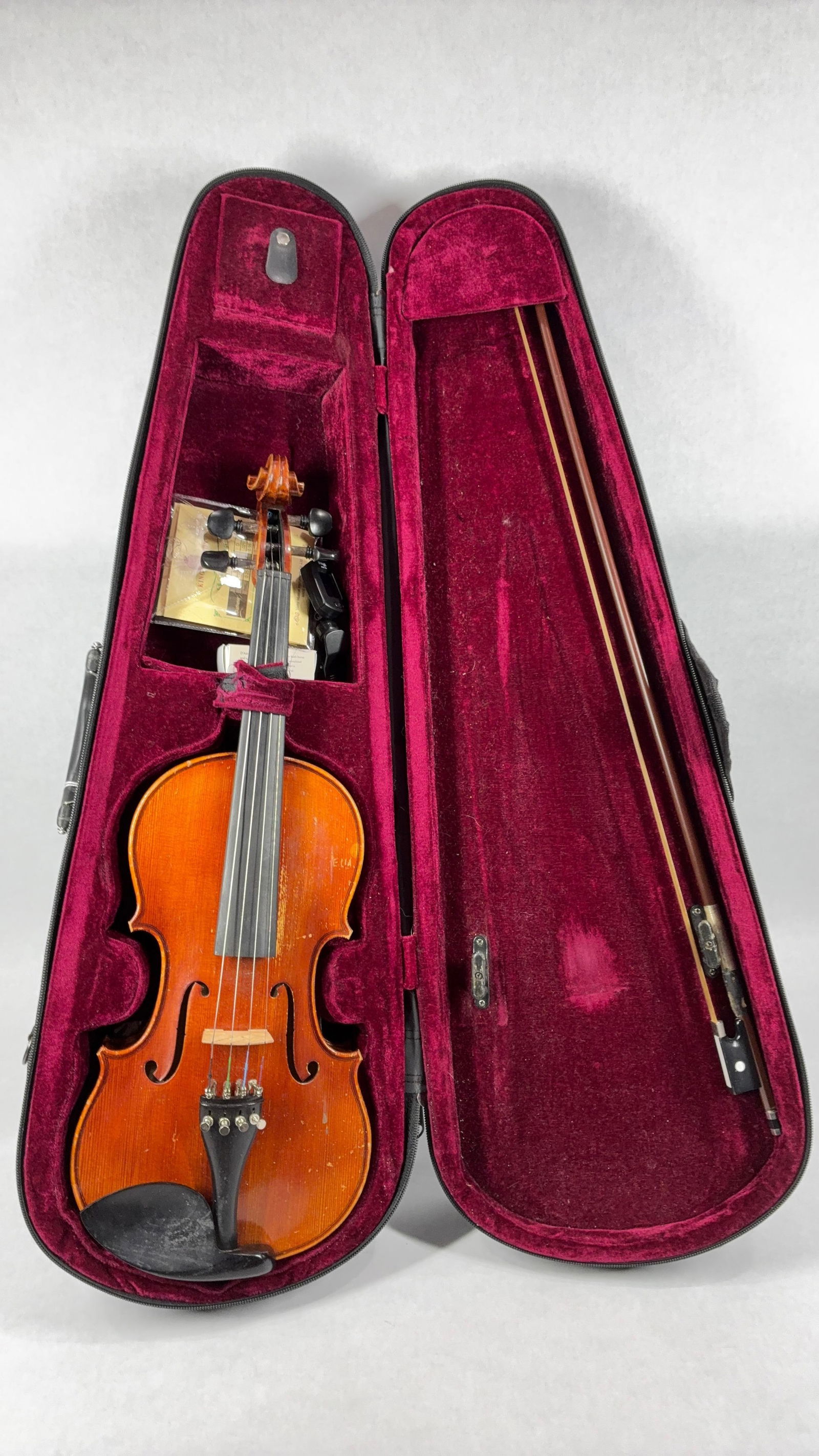 Student Trade Model Violin Bow and Case: overall good condition with accessories showing wear due to age and play 22 in.? in? velvet lines nylon zippered case?
