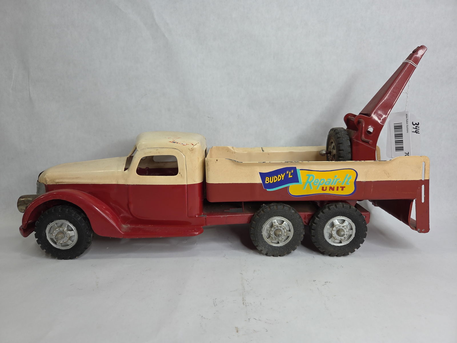 Buddy L Repair-It Unit Wrecker Truck: possible repaint with areas of denting and wear showing due to age and play