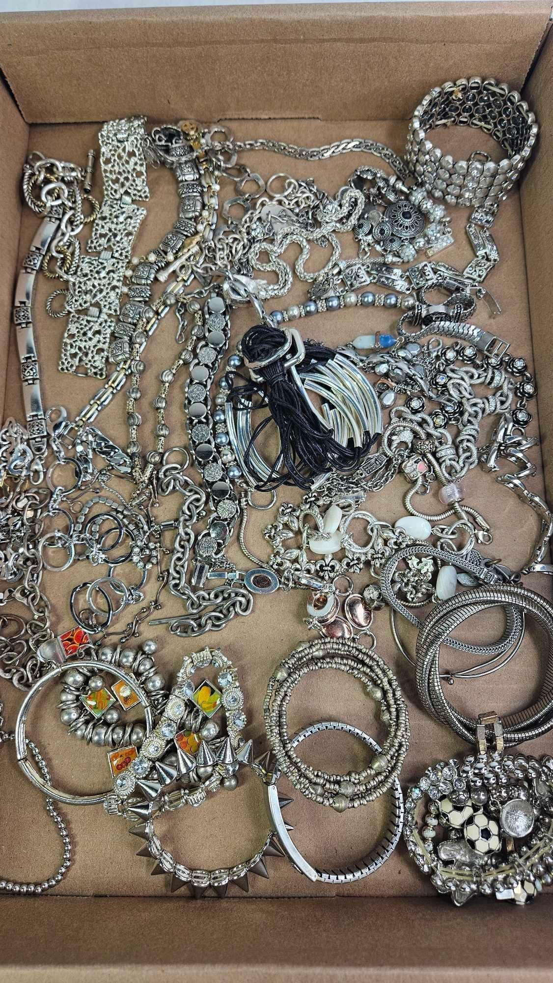 Chains, Steampunk, Chains, and Silver Toned Jewelry: Spiked bracelet, mesh, chains, charm bracelets, and more.